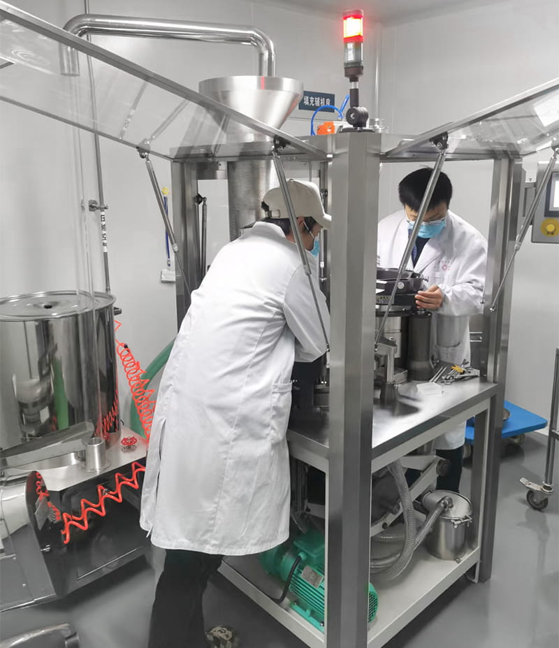 Workers are maintaining Pharma Equipment