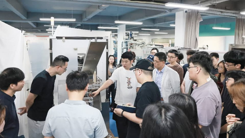 RQ-ZH-120L Automatic Vertical Cartoning Packing Machine internal training session