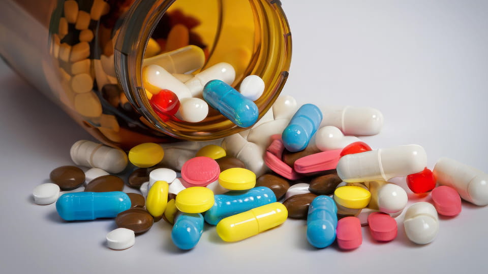 The pills and capsules were poured out of the medicine bottle