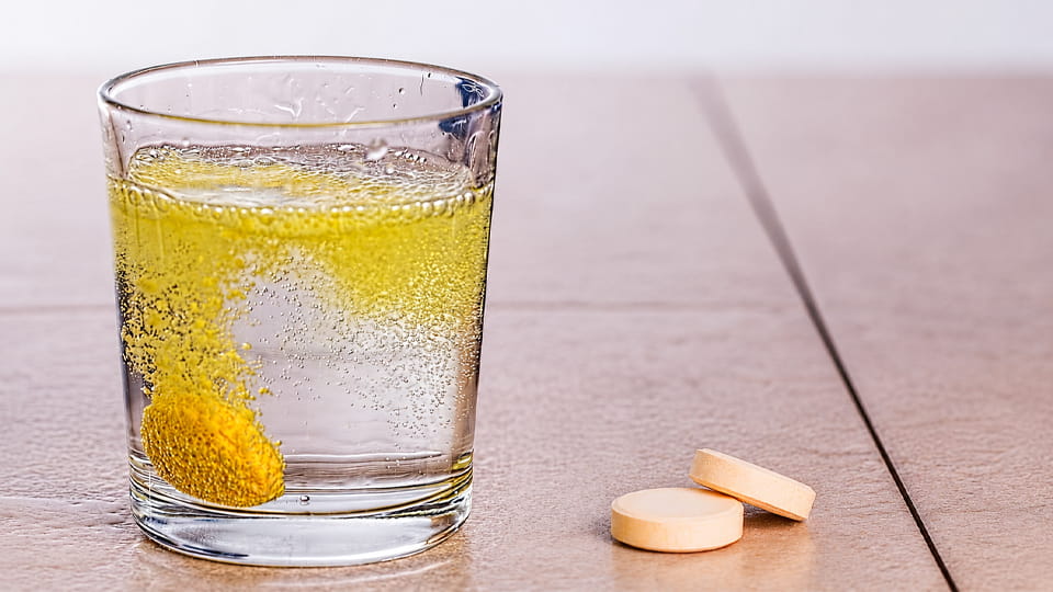 Effervescent tablet dissolves in water