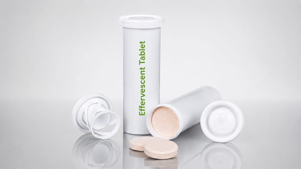 Effervescent tablets are packed in plastic tubes with desiccant-containing caps