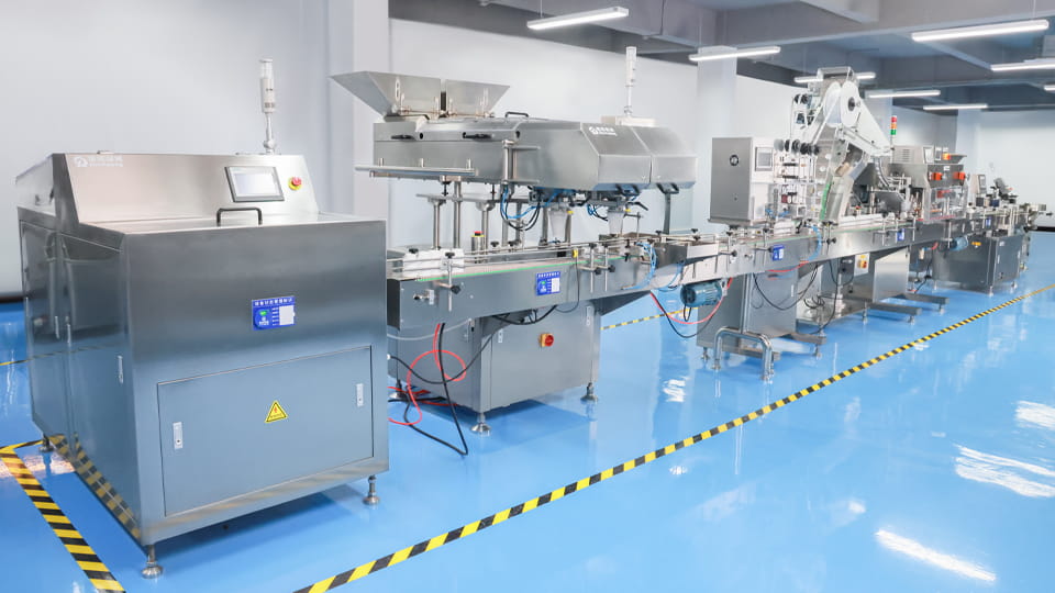 a bottle packaging line from empty bottle feeding to final cartoning