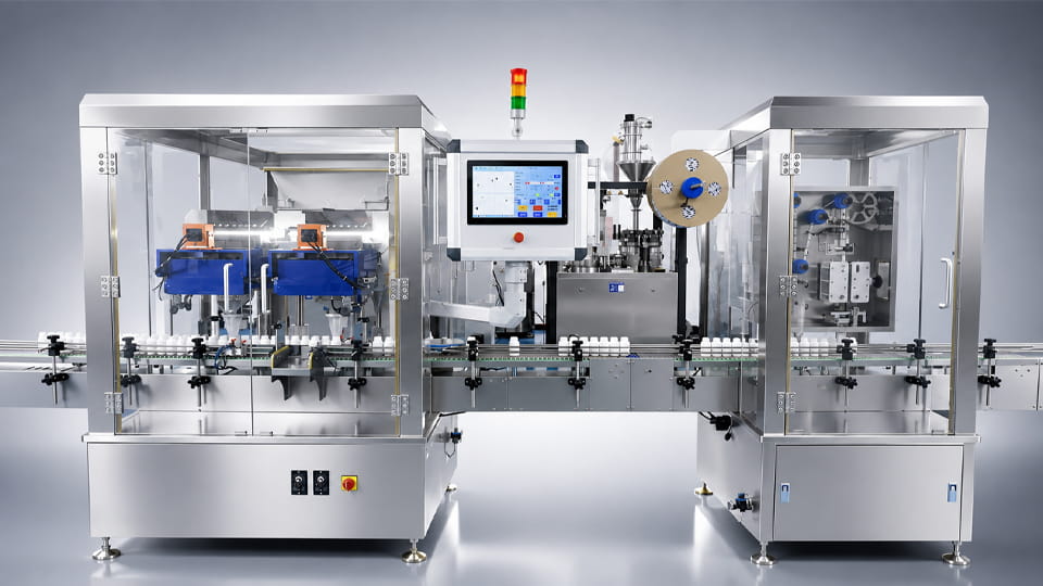 a typical pharmaceutical bottle packaging line showing bottles being unscrambled, filled, capped, sealed, and labeled