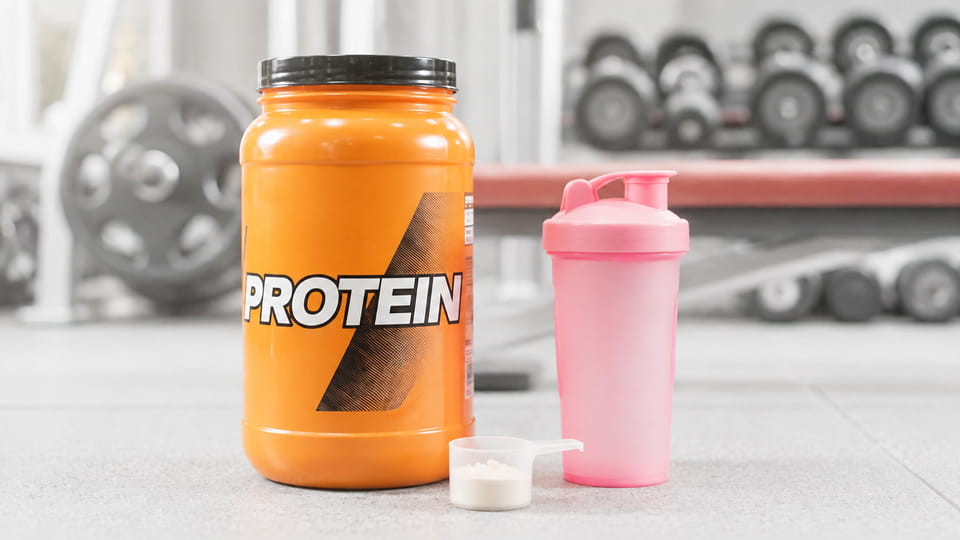 Protein powder packaged in jars and tubs
