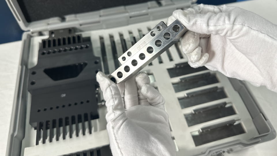 Capsule filling machine tooling enables quick changeover between different capsule sizes for multi-product manufacturing.
