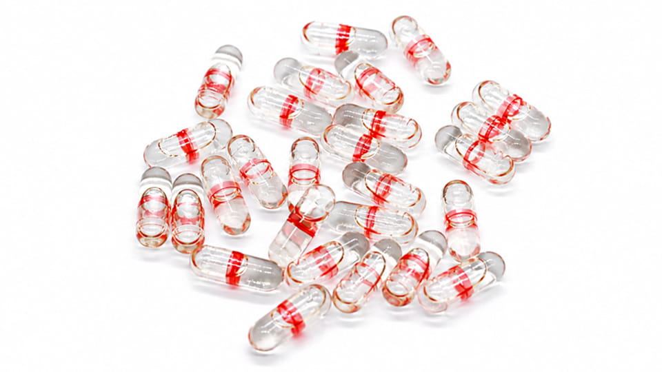 Transparent hard capsules with red band sealing